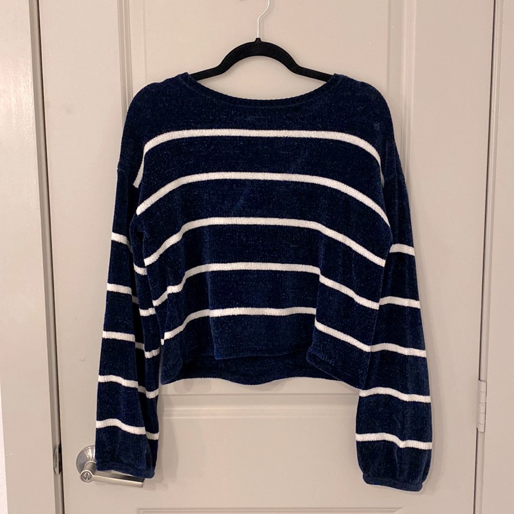 Navy blue and white striped sweater. Short length fit